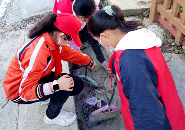 沙河鄉明德小學開展“ 新時代文明踐行者”小小志愿者服務活動
